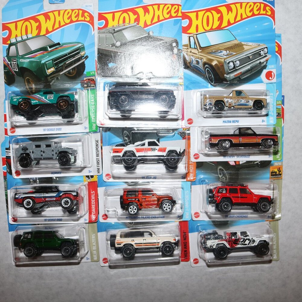 Hot Wheels lot of 12 Trucks variety of series all NIP
